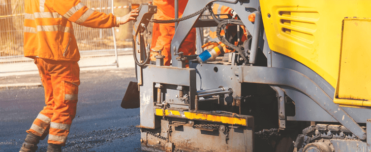 a construction worker and a vehicle
